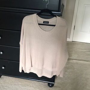 Cream sweater- tiny hole on bottom left